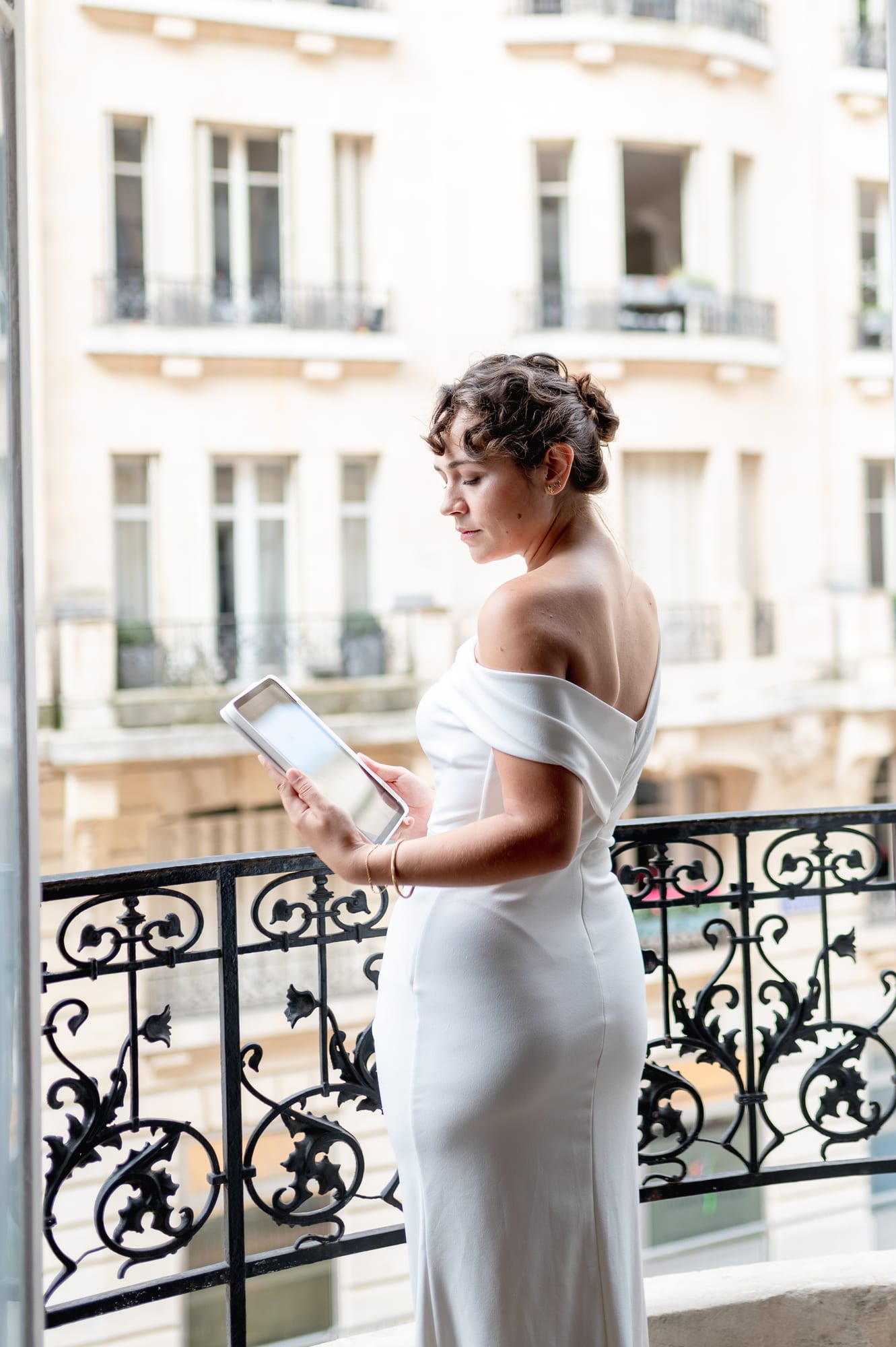 A bride browsing her Client Portal on a tablet